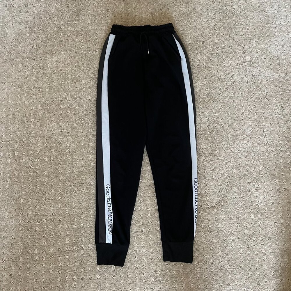 black joggers with white stripe